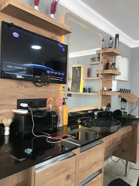 Tiraş Dünyasi - Photo 2